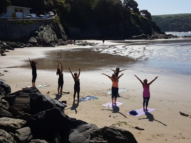 Yoga session on the beach